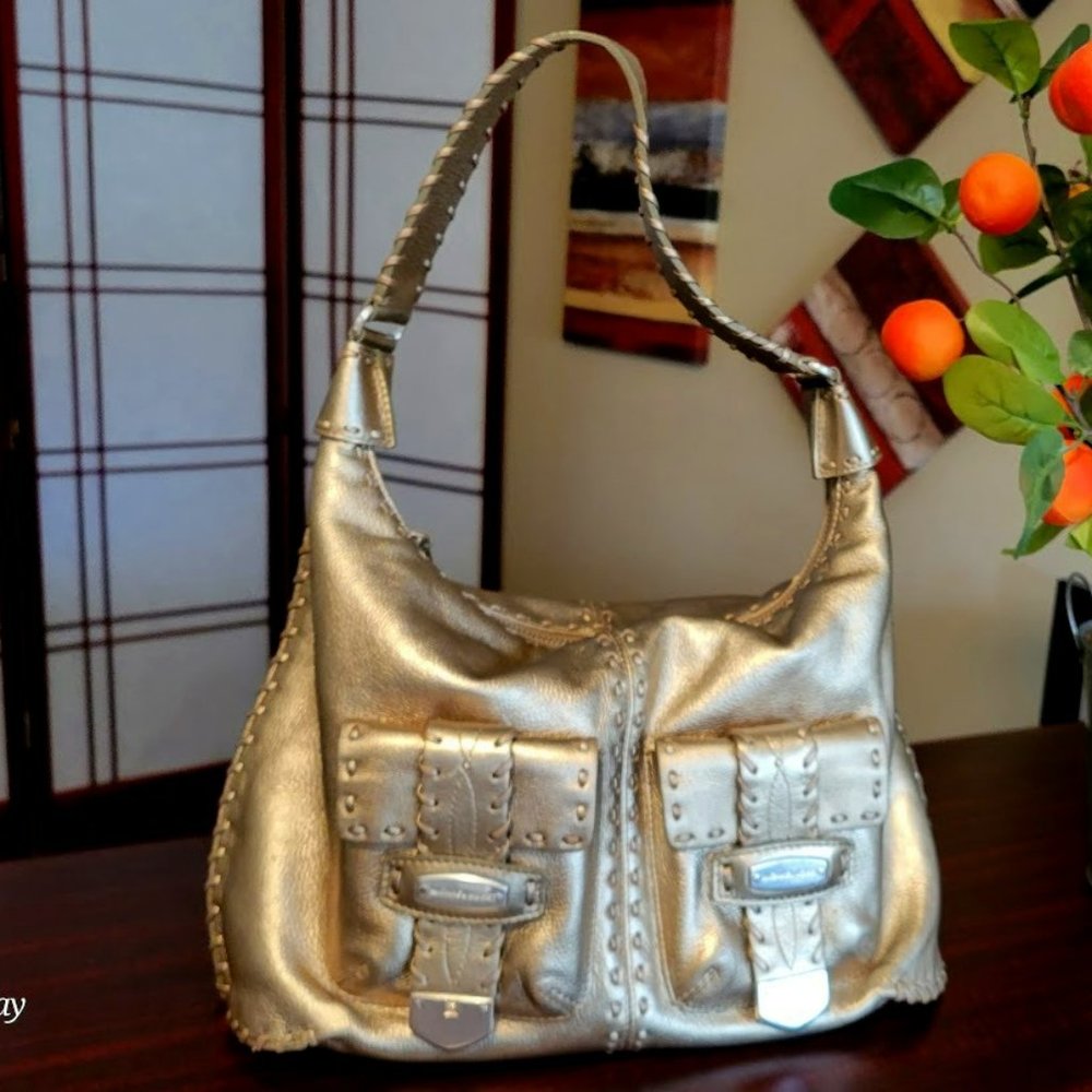 Micheal Kors gold bag.